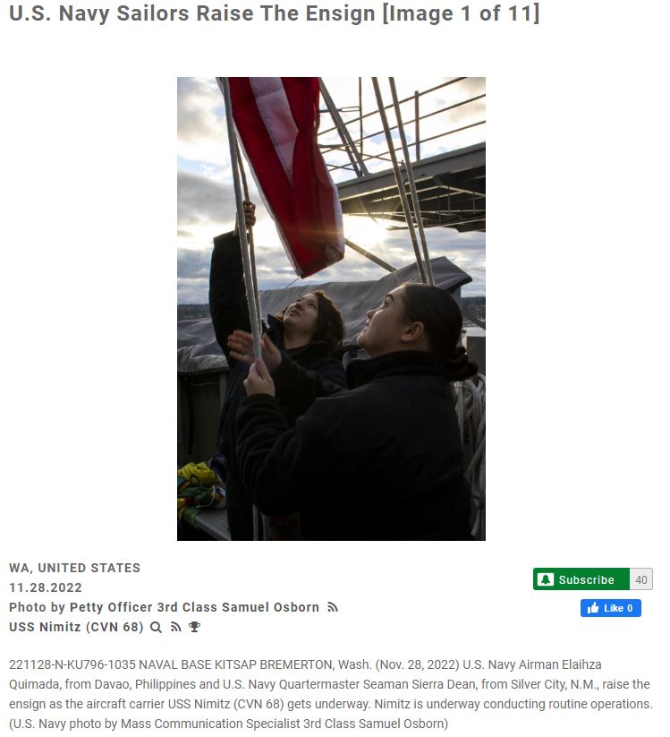 Local U.S Navy Seaman Raises the Ensign on the USS Nimitz